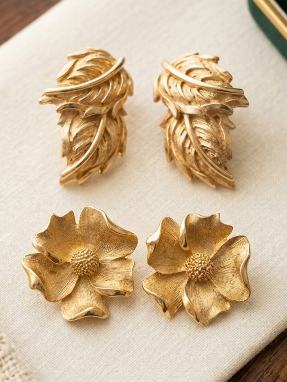 Vintage Monet Gold Tone Flower & Textured Leaf Clip On Earrings Set of 2